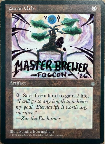 Ice Age Zuran Orb, hand-altered with MASTER BREWER, FOGCON and '26 painted across the art